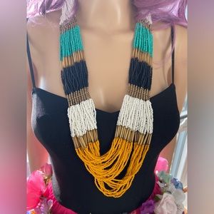 30-Strand Necklace in Turqouise, White, Black, Gold & Mustard Yellow Hued Beads